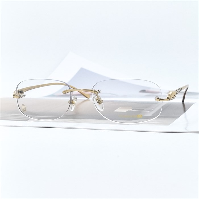 CARTIER CT0058O Titanium 003 золото BR01847