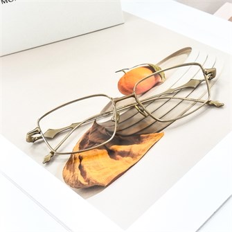 {{photo.Alt || photo.Description || 'GENTLE MONSTER ATOMIC Titanium золото'}}