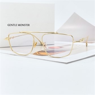 {{photo.Alt || photo.Description || 'GENTLE MONSTER MARTIN Titanium золото'}}