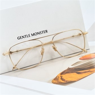 {{photo.Alt || photo.Description || 'GENTLE MONSTER MET Titanium золото'}}