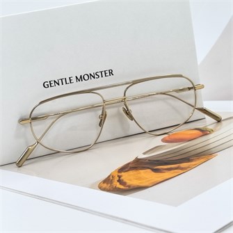 {{photo.Alt || photo.Description || 'GENTLE MONSTER RAFFLES Titanium золото'}}