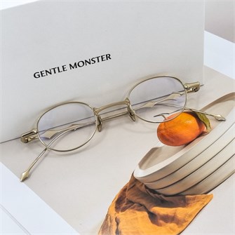 {{photo.Alt || photo.Description || 'GENTLE MONSTER ZODIAC Titanium золото'}}