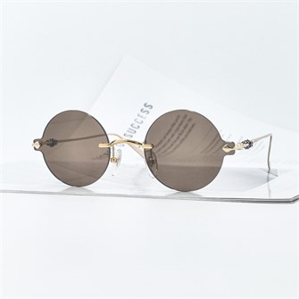 {{photo.Alt || photo.Description || 'CHROME HEARTS CH5712 золото коричневый'}}