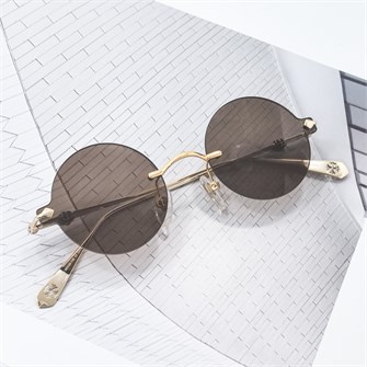 {{photo.Alt || photo.Description || 'CHROME HEARTS CH5712 золото коричневый'}}